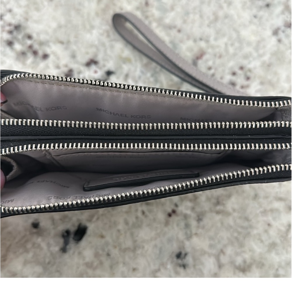 MK Wristlet on jet set travel color